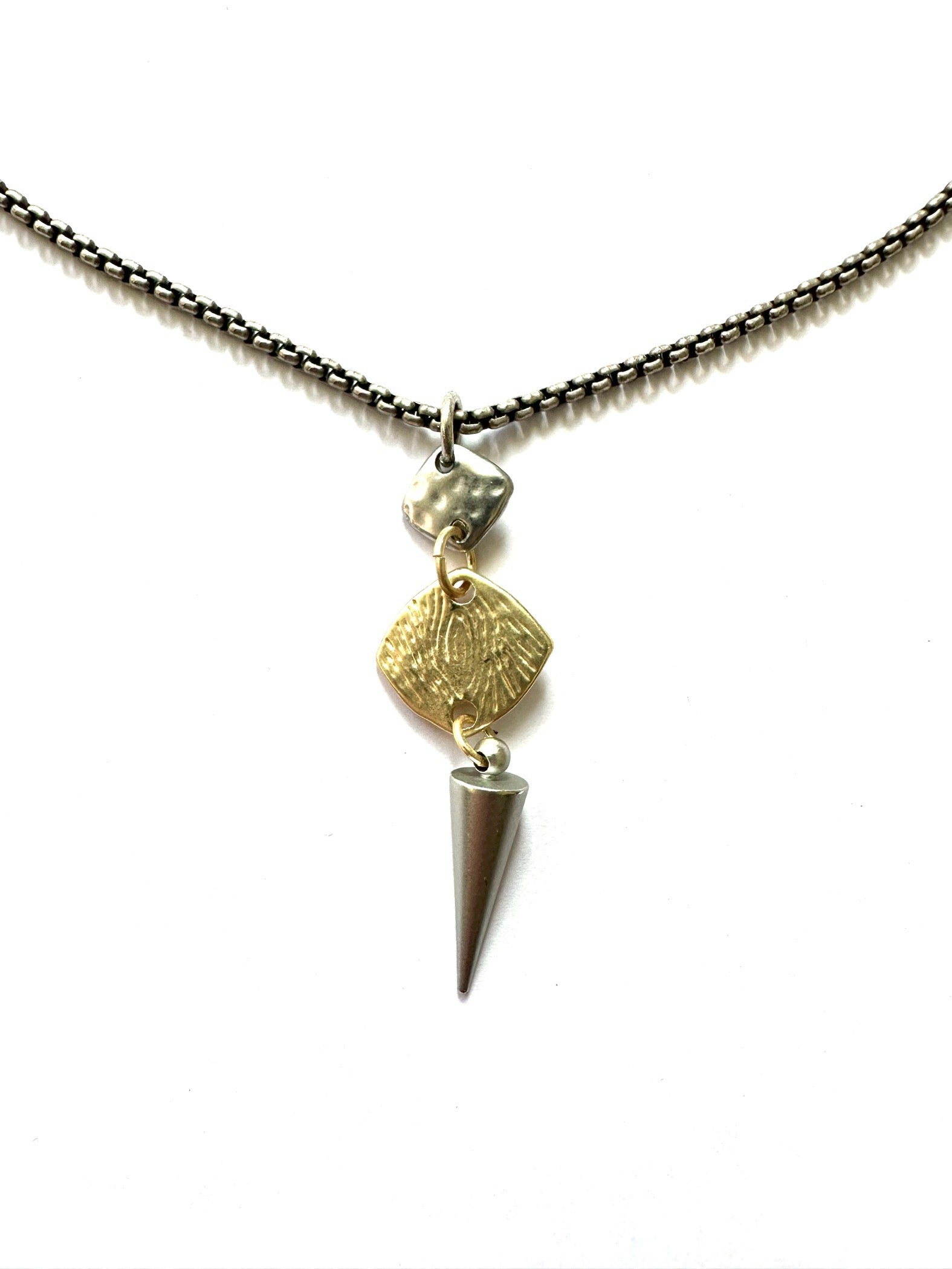 Amber - Geometric necklace with spike drop